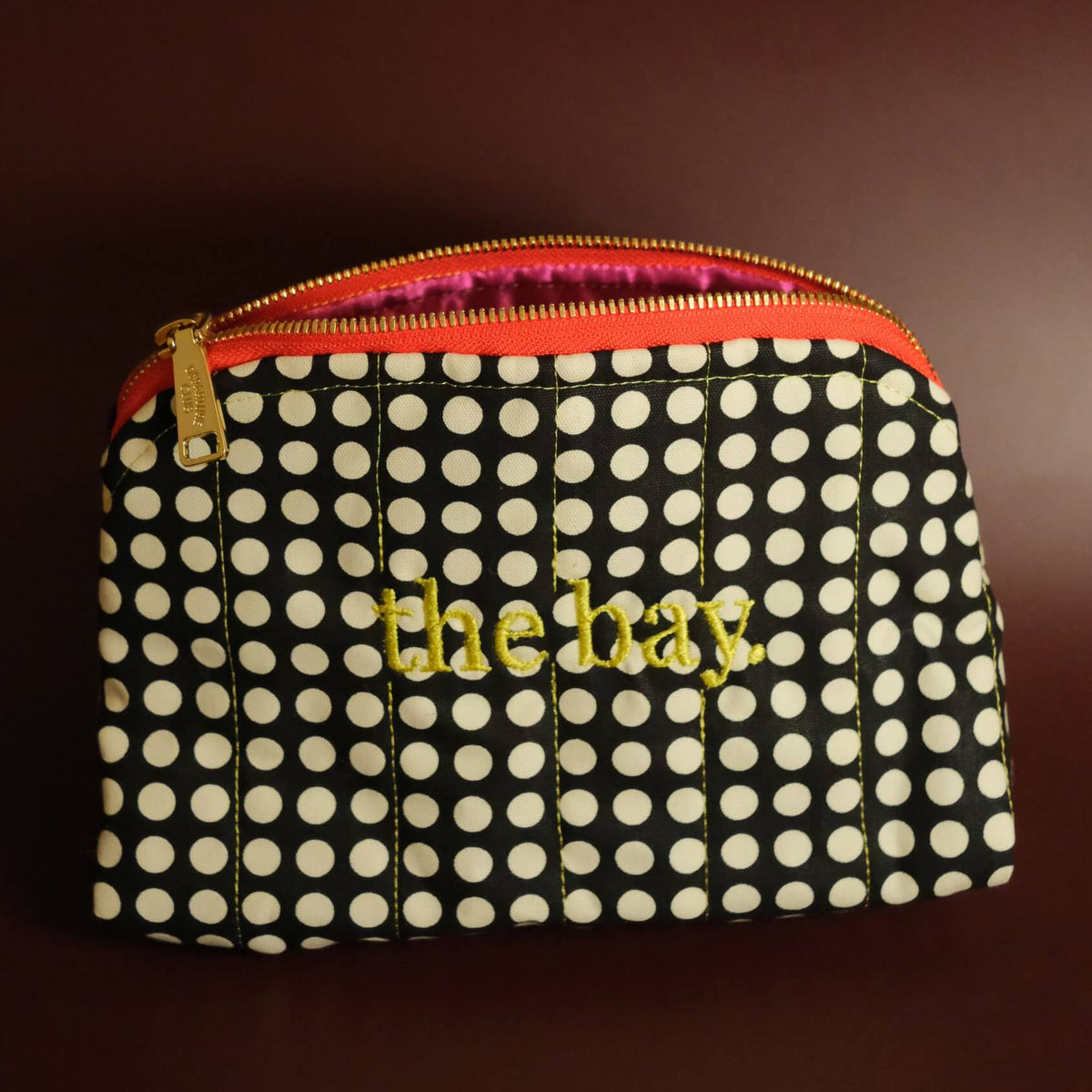 The bay dotted travel zip