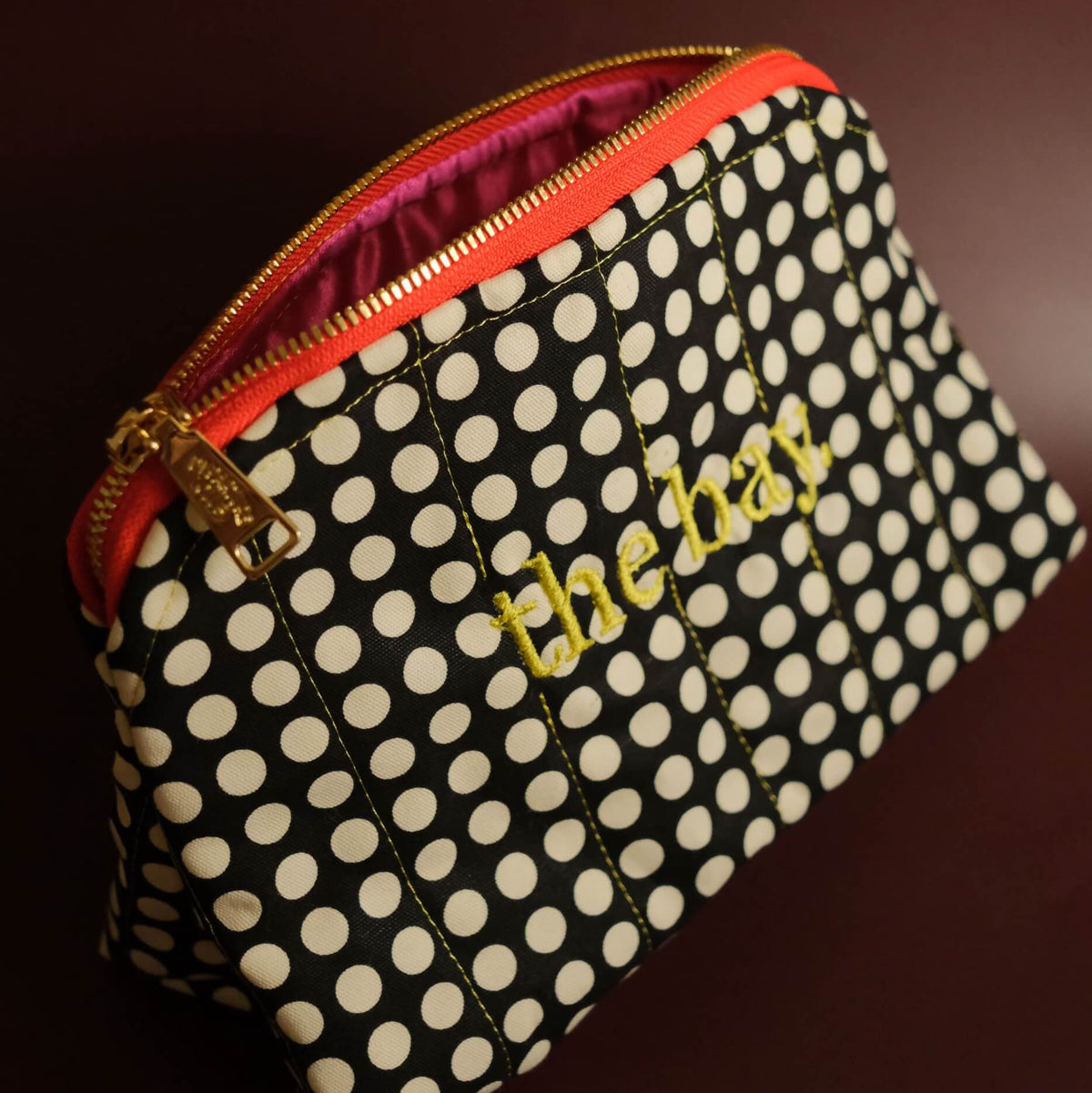 The bay dotted travel zip