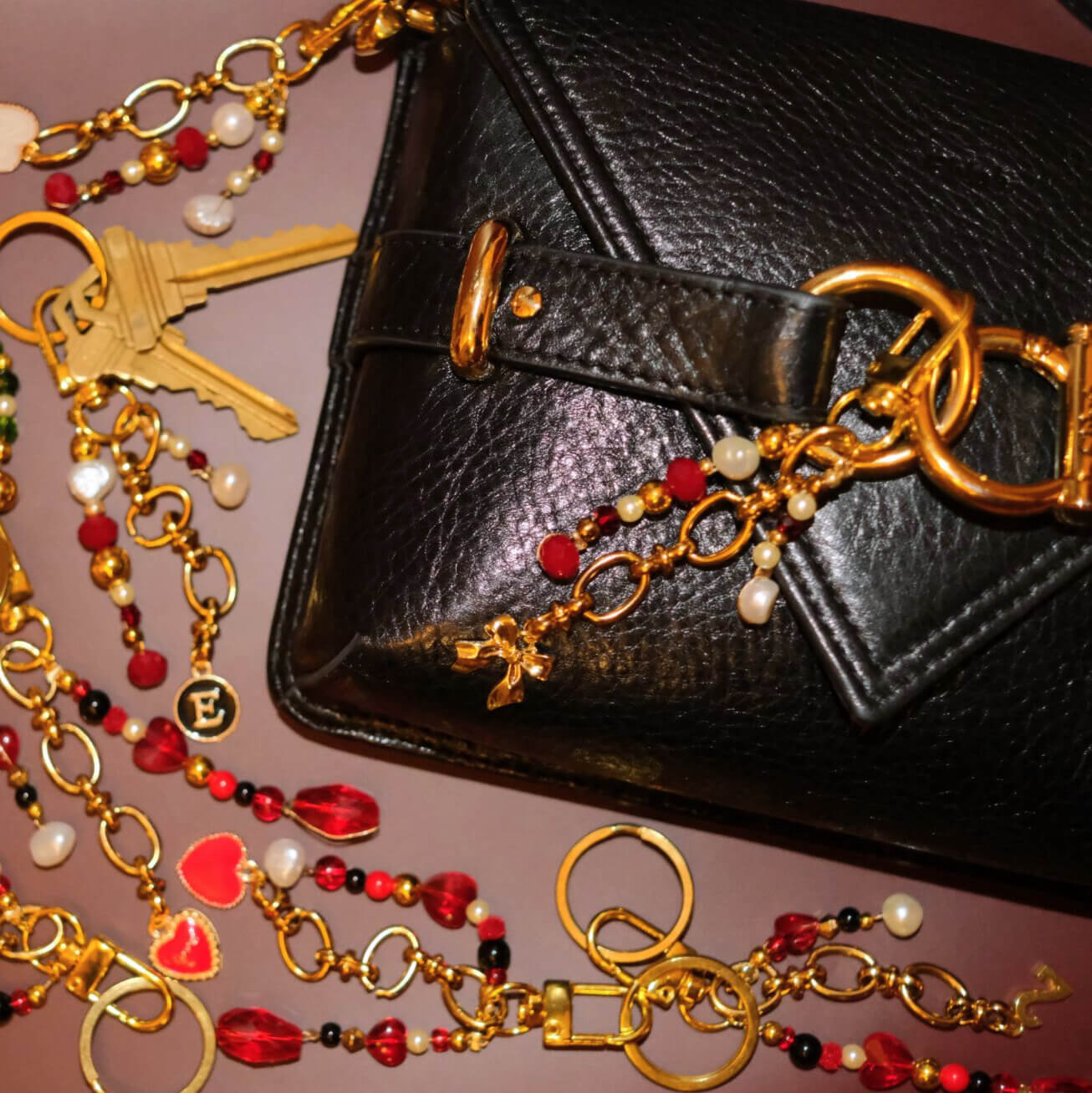 Beaded bag charm in bordeaux pearl